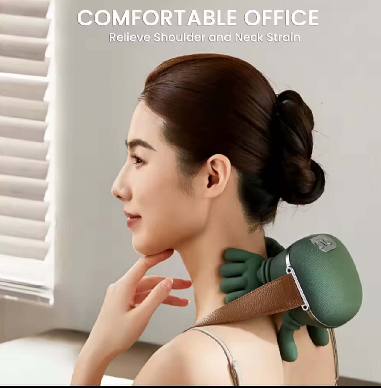 MassageMate Pro™ massage device relieving shoulder and neck strain in a comfortable office setting.